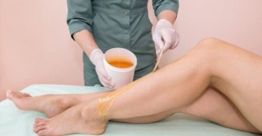 Waxing Hair Removal Service to remove unwanted hair from legs.