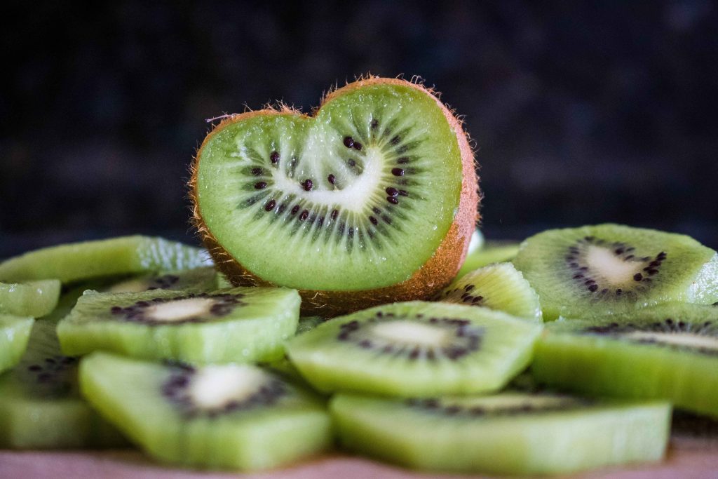 Slices of kiwi fruit table for the concept of Kiwi Allergy.
